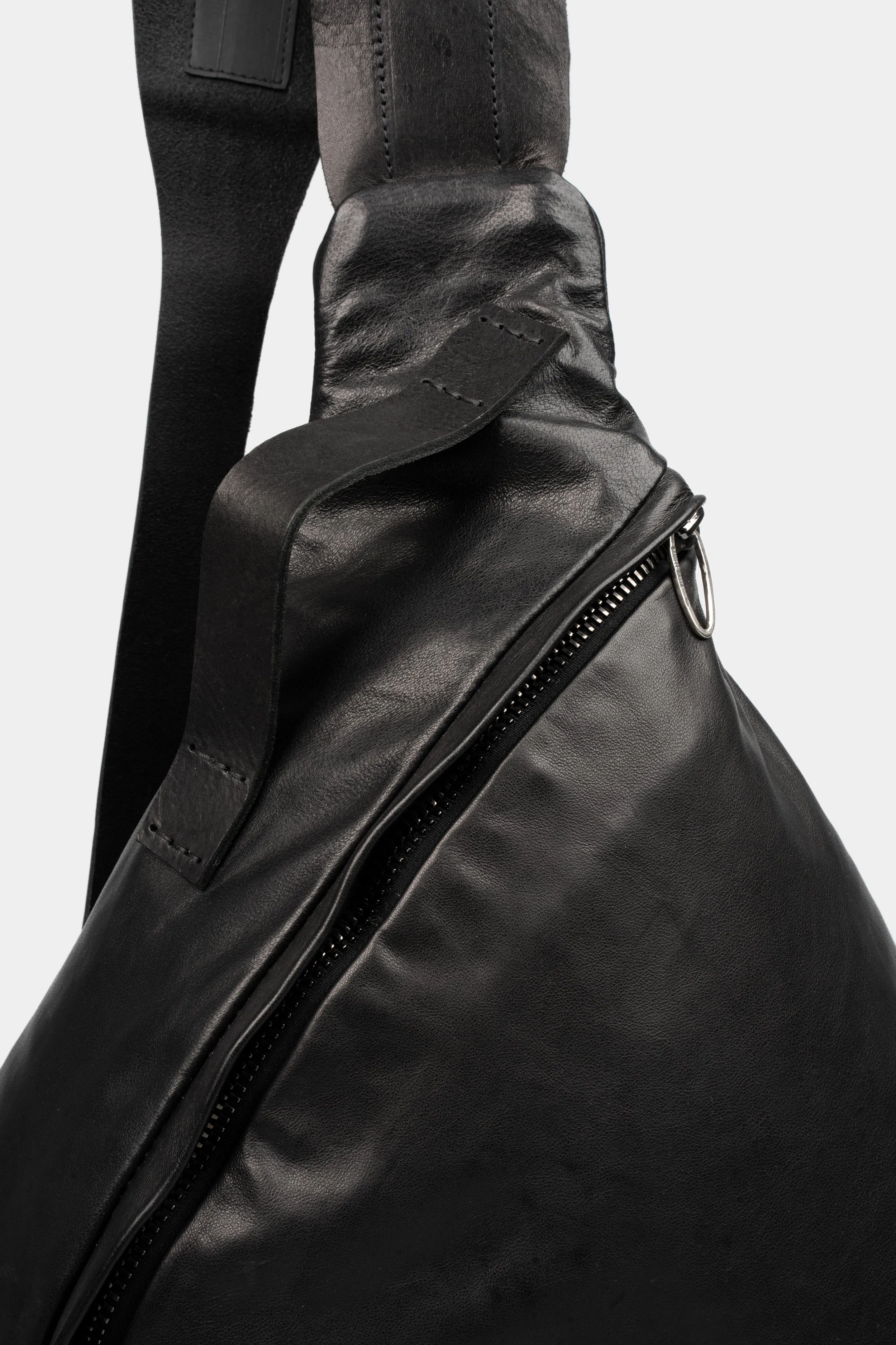 Triangle leather sling bag