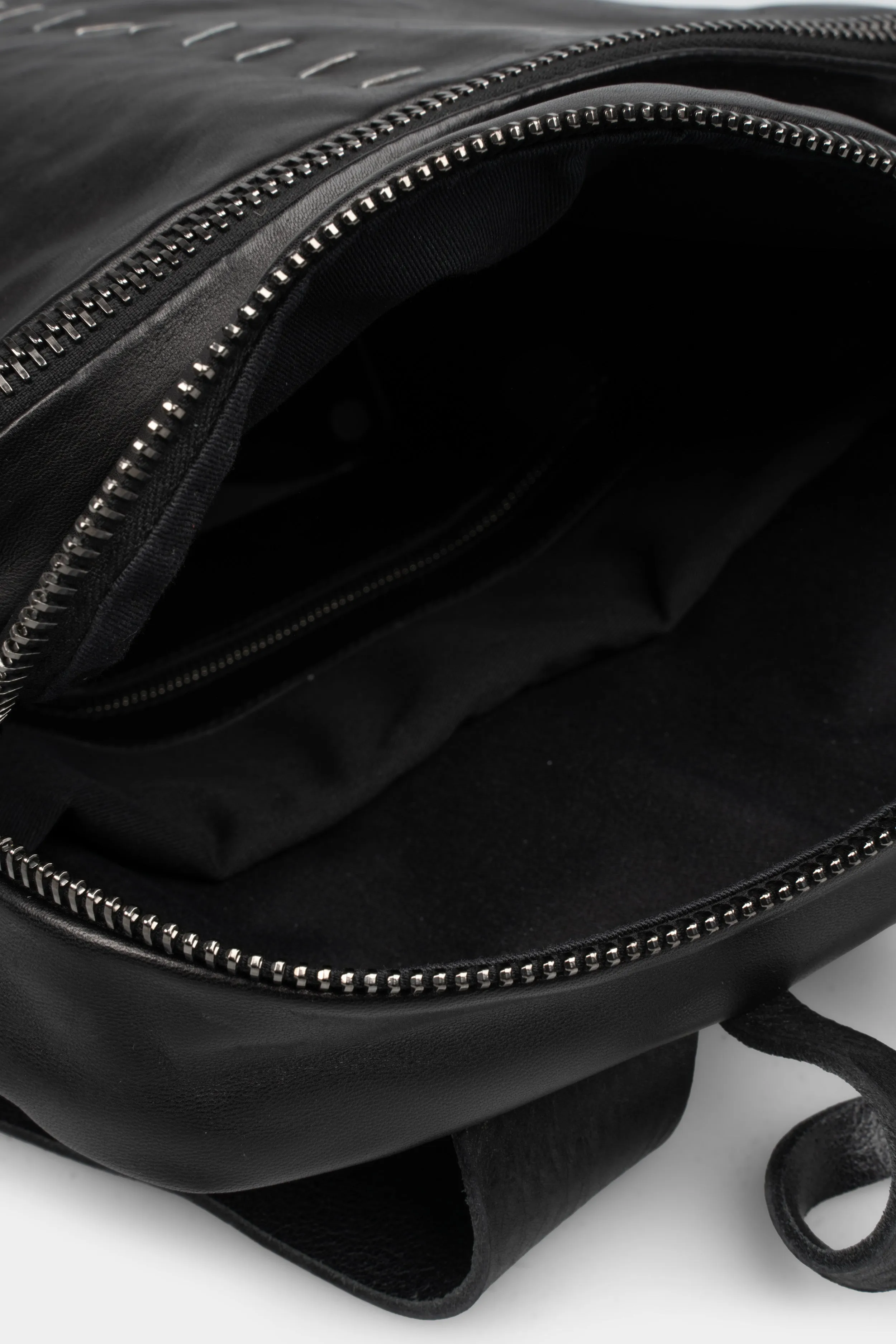 Triangle leather sling bag